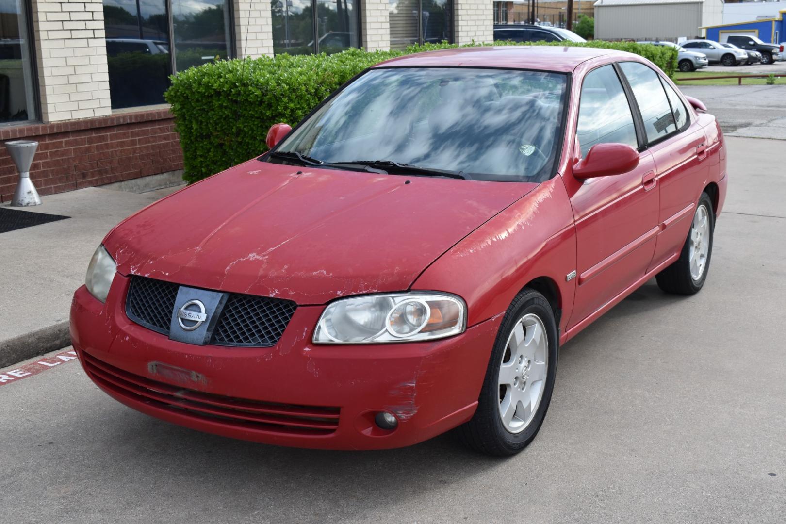 2005 Red Nissan Sentra 1.8 (3N1CB51D25L) with an 1.8L L4 DOHC 16V engine, 4 SPEED AUTOMATIC transmission, located at 5925 E. BELKNAP ST., HALTOM CITY, TX, 76117, (817) 834-4222, 32.803799, -97.259003 - Photo#1